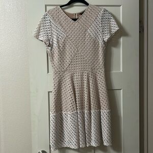Mini length pale pink and white dress. Like new. Size medium
